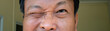 Eyes,Close-up of beautiful Middle aged asian man with black eyes.He closed one eye.