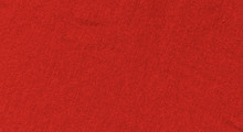 Bright Red Texture Of Knit Fabric. Red Textile Background With Natural Folds. Close-up