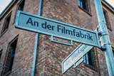 Fototapeta  - street sign in German Filmfabrik meaning Film Factory located in historical area still used to film movies and television shows