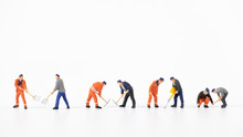 Miniature People On White Background,teamwork Concept