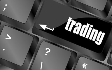 Poster - business concept. Button on Modern Computer Keyboard with Word trading