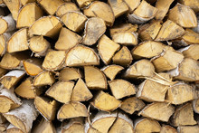 Stack Of Firewood, Textured Of Dry Chopped Logs For Wallpaper, Natural Wood Background For Design Template.