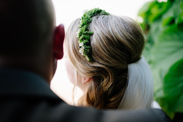 Wall Mural - photo of a brides hair style in the garden