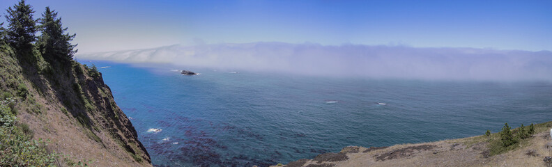 Wall Mural - Panorama view of a wall of Fog over the water as seen from Cape Foulweather overlook