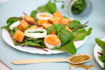 Wall Mural - green vegetable salad, few calories fitness concept, on bright background. Place under the text.