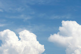 Fototapeta Niebo - spring cumulus clouds against blue sky

