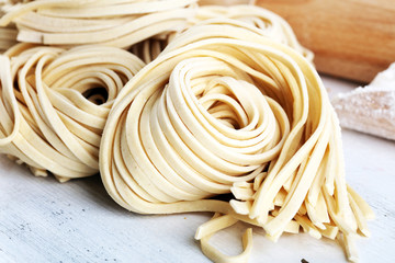 Wall Mural - Closeup of raw homemade pasta. fresh italian traditional raw fresh pasta