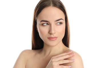 Wall Mural - Portrait of young woman with beautiful face on white background