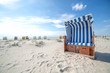 Blue and white striped beach chair or bench