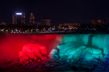 Wall Mural - Night Niagara falls. Colorful lights USA side
