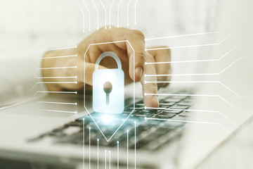 Aufkleber - Creative idea concept with lock symbol and microcircuit illustration and hands typing on laptop on background. Protection and firewall concept. Multiexposure
