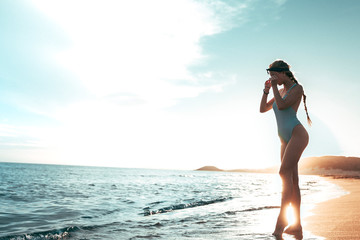 Wall Mural - sexy girl on an empty beach