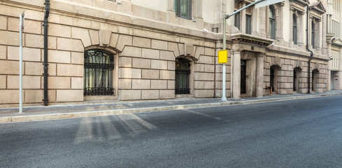 Asphalt road and the bund historic commercial building in Shanghai,China.