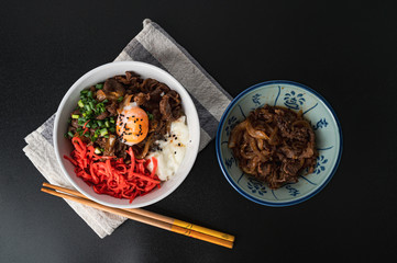 GYUDON Japanese beef & Rice,Japanese traditional dish Gyudon made from thinly sliced beef, onion, soy sauce and rice,food concept background