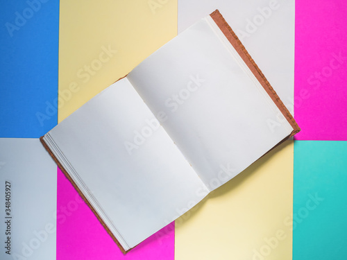 Notebook on a color background, Notebook on color paper © touch_of_eyes