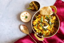 Dal Khichadi/Masala Khichdi/daal Khichdi Tadka Is A Healthy Indian Recipe Made Of Mixed Lentils & Rice Combined With Spices & Vegetables. Served With Curd Or Yogurt, Papad & Chili Pickle. Copy Space