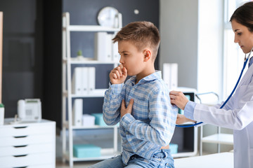 Sticker - Ill coughing little boy visiting doctor in clinic