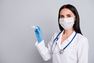 Poster - Close-up portrait of her she nice attractive confident friendly girl family therapist holding in hand thermometer result high fever flu grippe isolated over grey pastel color background