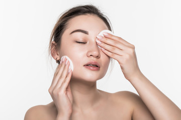 Wall Mural - Young attractive asian woman beauty use sponge isolated on white background