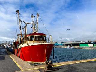 Fishing boats docked in the harbor