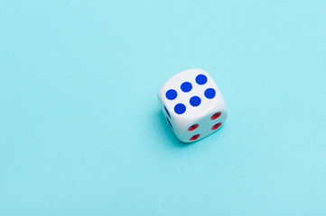 White dice on a blue background