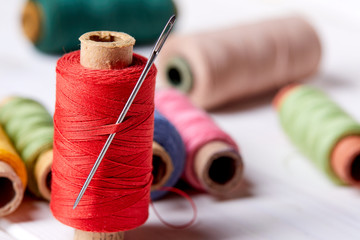 Poster - bobbins with thread and needles