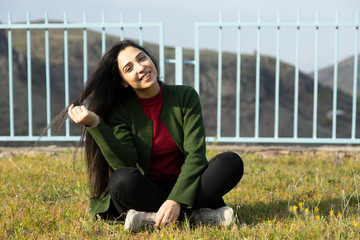 Poster - happy woman to the ground in nature