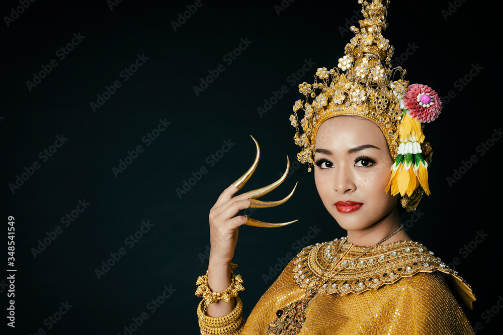 gold thai dress Shine in a Stunning Golden Evening Dress: Embroidered Gold Gown with a  Unique Neckline