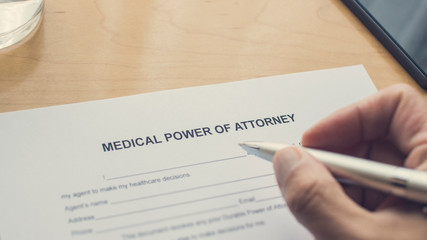 Wall Mural - A Medical Power of Attorney form on the desk. Writing a power or attorney form.