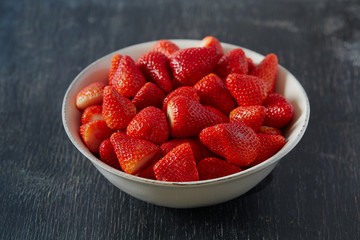 Wall Mural - strawberries on a dark wooden surface