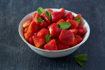 Wall Mural - strawberries on a dark wooden surface