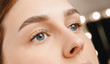 Young woman with beautiful eyebrows. Correction of brow hair