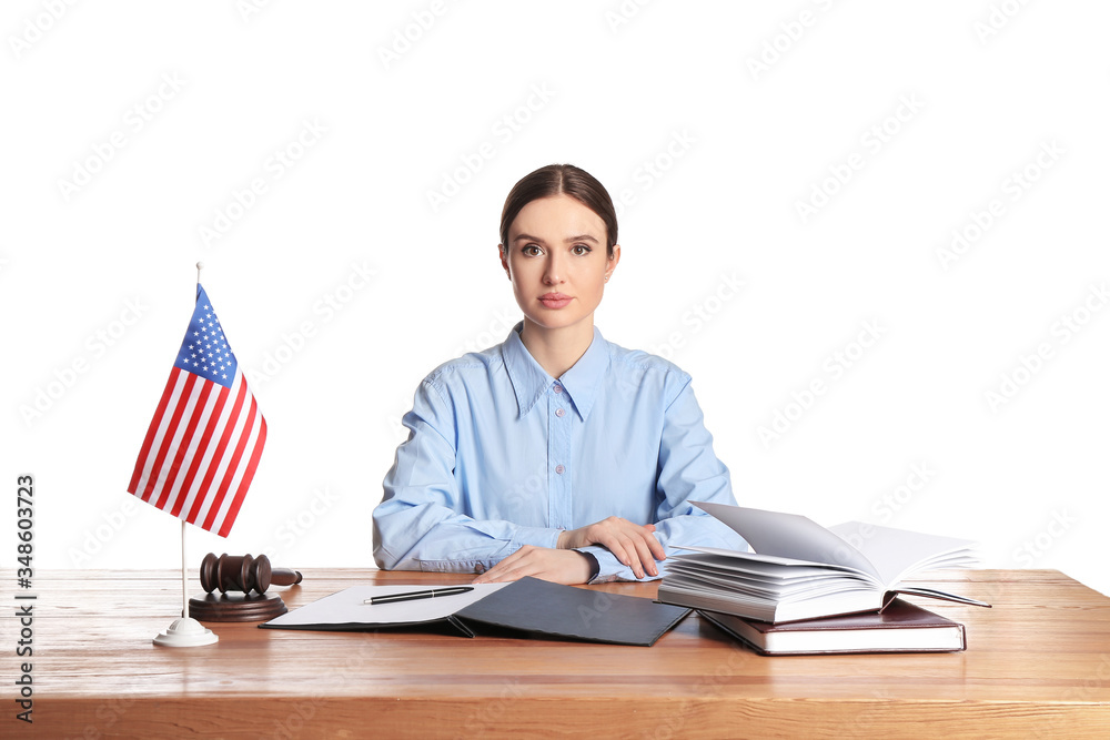 Female judge at table on white background