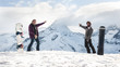 © guruXOX - Two happy and funny snowboarder make fun, drink beer and enjoy in beautiful winter alps mountain range