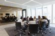 © Martin Barraud/Caia Image - Business people meeting in circle in conference room
