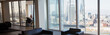 © Martin Barraud/Caia Image - Businesswoman in modern urban highrise conference room