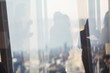 © Tom Merton/Caia Image - Silhouette business people talking in office window