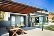 © Paul Bradbury/Caia Image - Sunny, modern home showcase patio