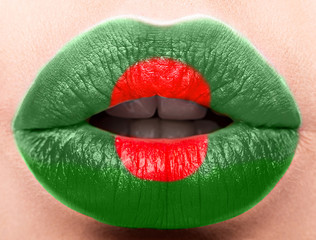 Female lips close up with a picture flag of Bangladesh. red, green