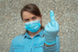  tired of coronavirus and quarantine. girl shows middle finger to covid 19