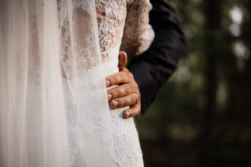 Sticker - photo of a wedded couple standing in nature