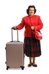 Wall Mural - Elderly woman with a suitcase