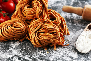 Wall Mural - Closeup of raw homemade pasta. fresh italian traditional raw fresh pasta