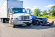 © vit - Road accident with damage to vehicles as a result of a collision between a semi truck with box trailer and a car