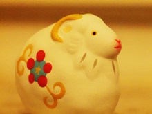 Yellow Sheep Toy On Table