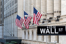 Wall Street Sign In Manhattan With New York Stock Exchange Background, New York City, USA