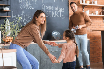 Canvas Print - Happy family spending time together in kitchen