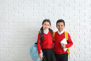 Wall Mural - Cute little pupils on white background