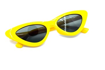 Wall Mural - Yellow sunglasses fashion isolated on yellow background