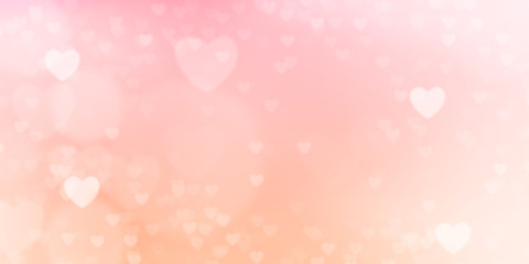 Glowing soft orange and pink bokeh background. Spring concept. Blurred bokeh hearth shapes.